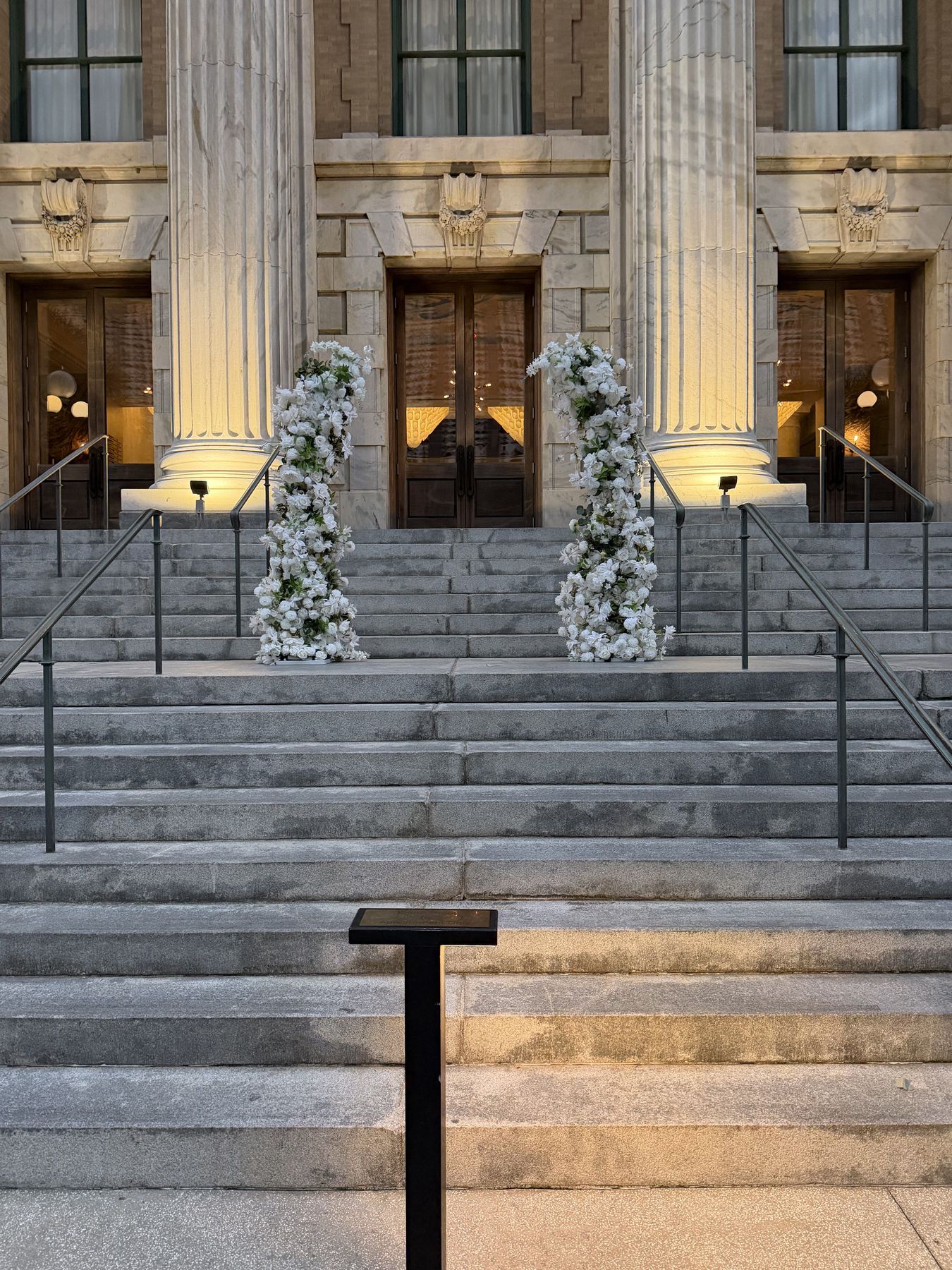 Serenity twin floral arches at a grand venue entrance in Tampa Bay